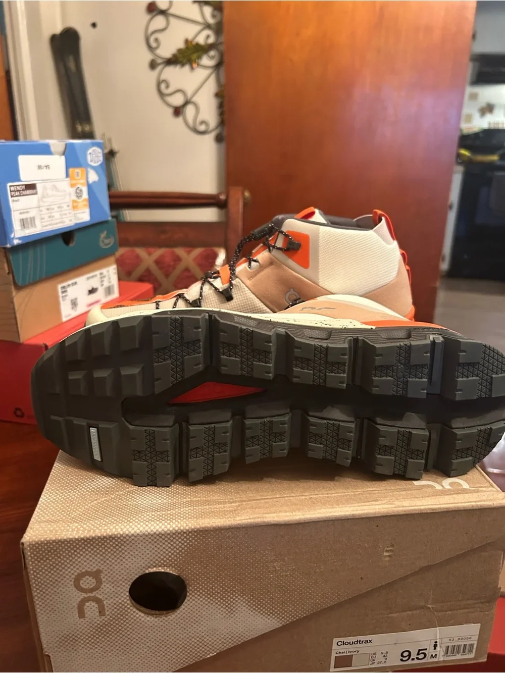 Men’s On Cloudtrax Shoes in Chalk/Ivory with Orange Accents